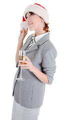 Image showing business girl in Santa hat and with champagne