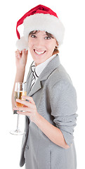 Image showing business girl in Santa hat and with champagne