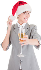 Image showing business girl in Santa hat and with champagne