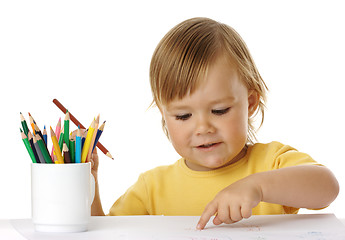 Image showing Child points on his drawing