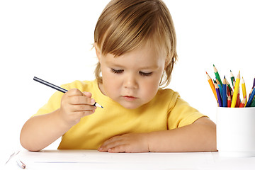 Image showing Cute child draw with color crayons