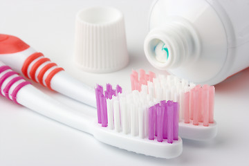 Image showing Two toothbrushes and toothpaste