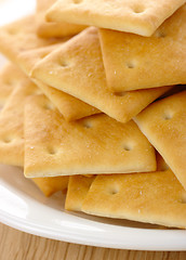 Image showing Yellow cookies on plate