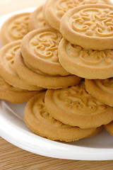 Image showing Yellow cookies on plate