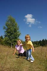 Image showing Mother and child play outdoors