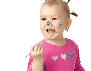 Image showing Little girl paint on her cheek