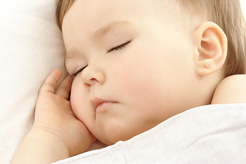 Image showing Cute child sleep with hand under his cheek