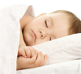 Image showing Cute child is sleeping in bed