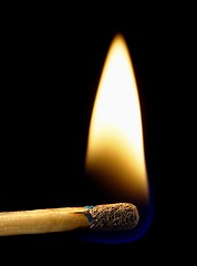 Image showing Burning match on a black background