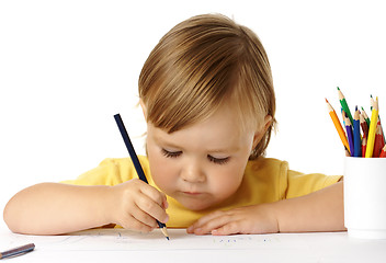 Image showing Cute child focused on drawing