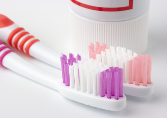 Image showing Two toothbrushes and toothpaste