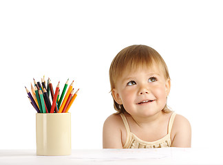 Image showing Child with bunch of color crayons