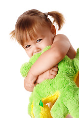 Image showing Cute girl embracing her soft toy