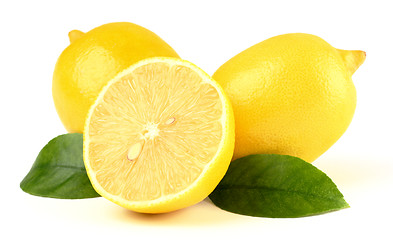 Image showing Group of lemons with leaves