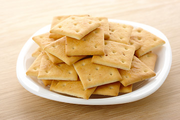 Image showing Yellow cookies on plate