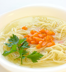 Image showing Chicken soup with spaghetti