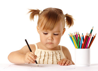Image showing Cute preschooler focused on drawing
