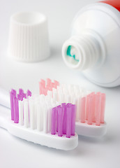 Image showing Two toothbrushes and toothpaste