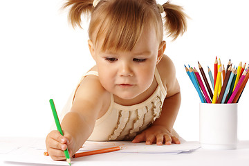 Image showing Cute child draw with crayons