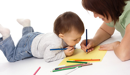 Image showing Mother teach her child to draw