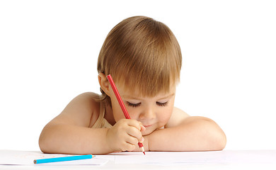 Image showing Child draw with red crayon