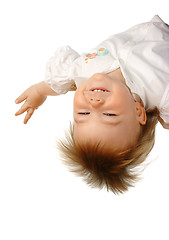 Image showing Little girl hanging upside down