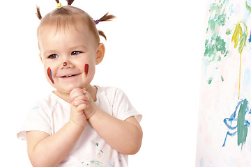 Image showing Little girl play with paints