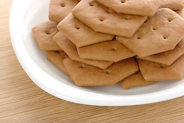 Image showing Brown cookies on plate