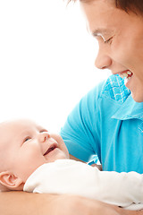 Image showing Happy father smile to his child