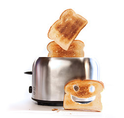 Image showing Toaster with slices of toast 