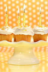 Image showing Cupcakes with orange zest sprinkled on top