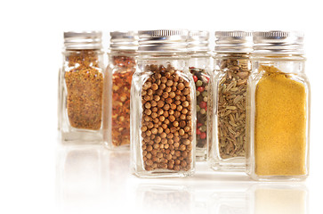 Image showing Assorted spice jars isolated on white