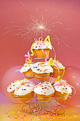 Image showing Cupcakes with sparkler on top 