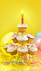 Image showing Lots of cupcakes on yellow background