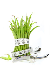 Image showing Unwashed green beans with cord and utensils 