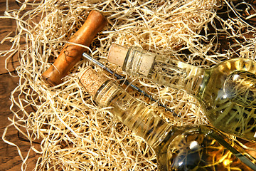 Image showing Bottles of wine  with cork screw