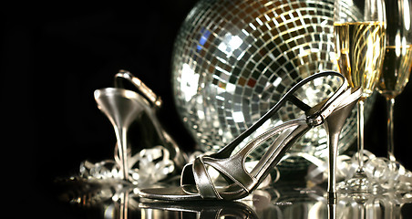 Image showing Silver party shoes with champagne glasses 