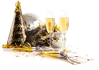 Image showing Champagne glasses with festive party hats on white 