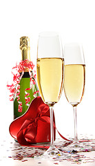 Image showing Glasses of champagne with red ribbon heart