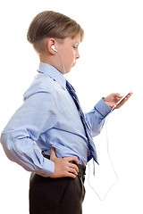 Image showing Boy with a music player