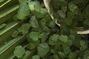 Image showing bath salt and palm leaf