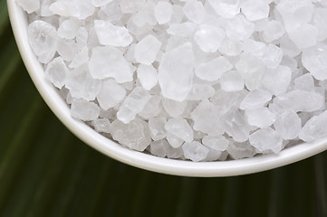 Image showing bath salt and palm leaf