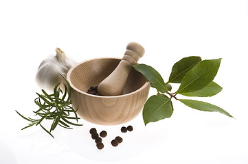 Image showing Mortar and pestle, with fresh-picked herbs