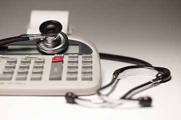 Image showing Black Stethoscope on Calculator