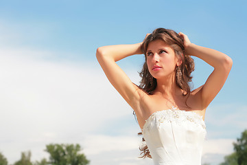 Image showing pretty woman on background blue sky