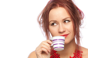 Image showing Young woman with coffee cup