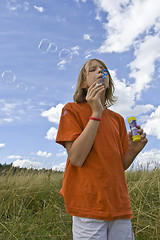 Image showing Childrem blowing bubbles