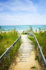 Image showing Wooden walkway over dunes at beach