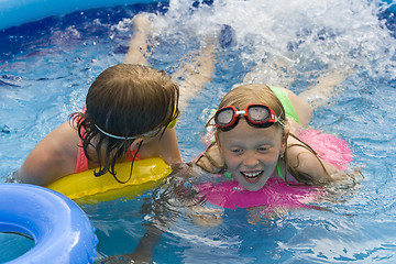 Image showing Children in paddling pool