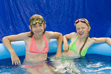 Image showing Children in paddling pool